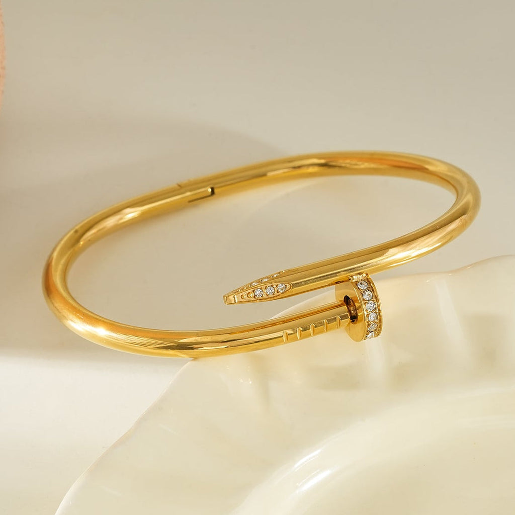 DAVIDKA Gold: Zirconia Embedded Industrial-Chic Twisted Nail Bracelet