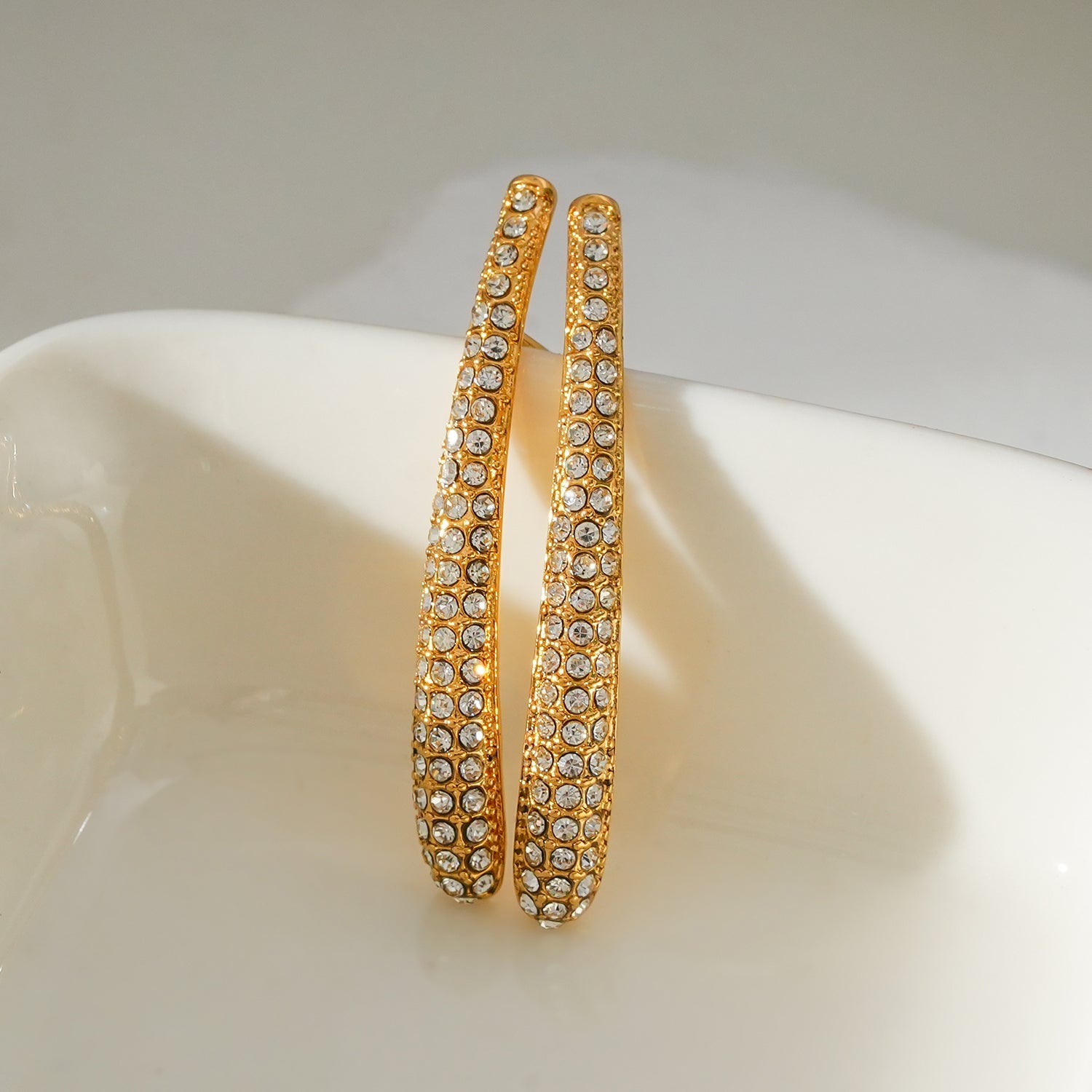 Style HILO: Curved Pavé Zirconia Shaped Stud Earrings in Silver