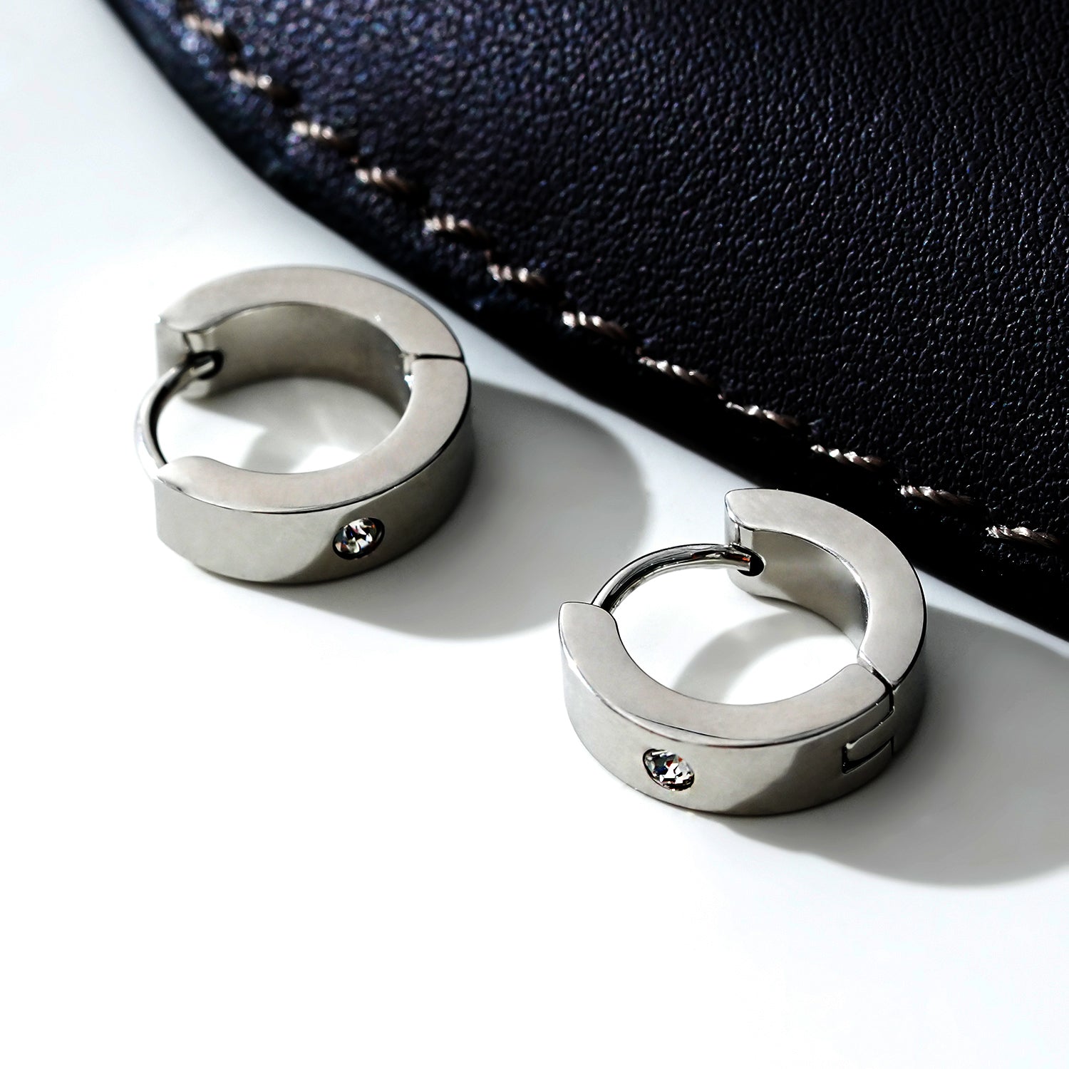 INIS: Wide Mini Hoop Earrings with a Solitaire Zirconia Gemstone in Silver