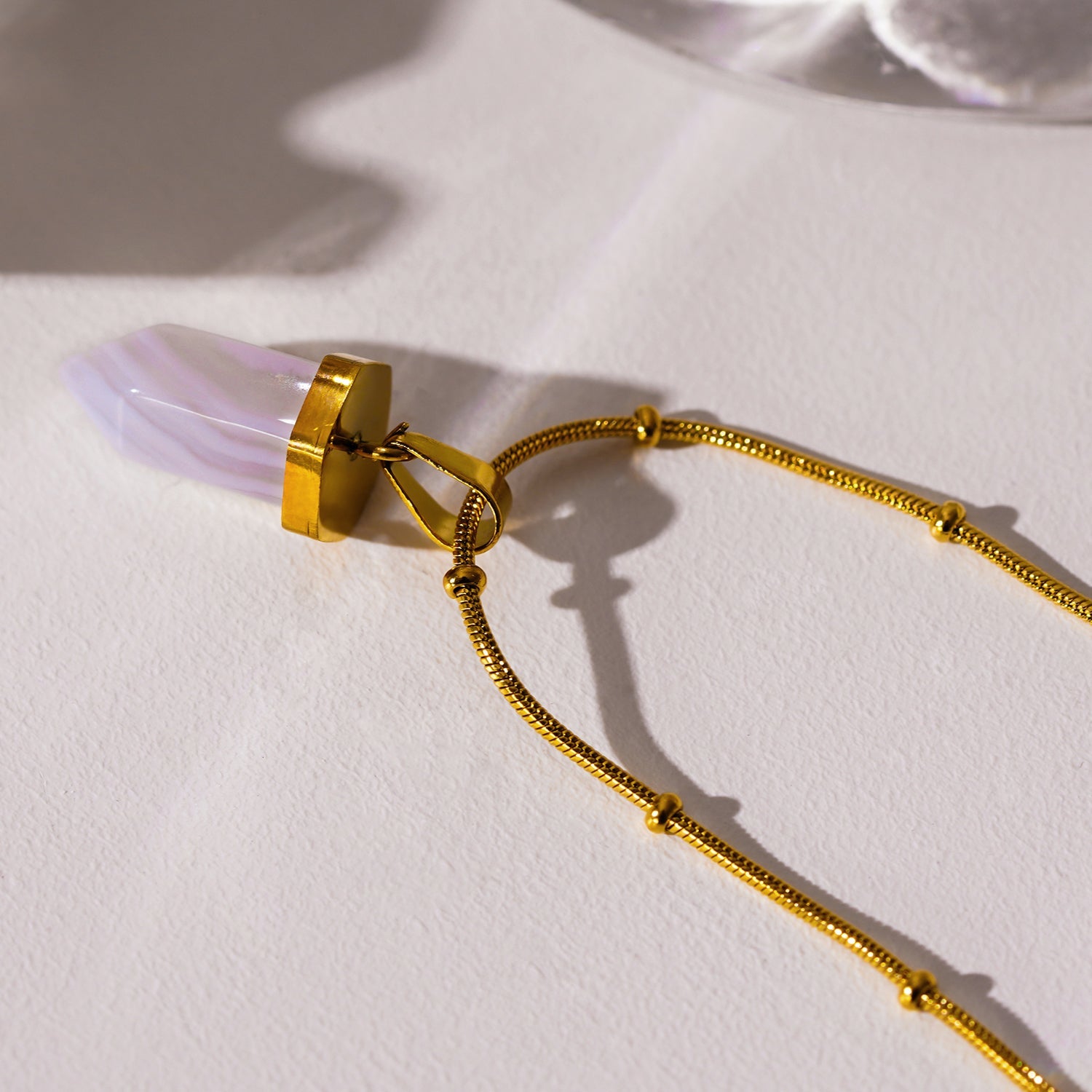 MAKEDA: Amethyst Stone Pendant Anchored on a Beaded Snake Skin Textured Chain Necklace