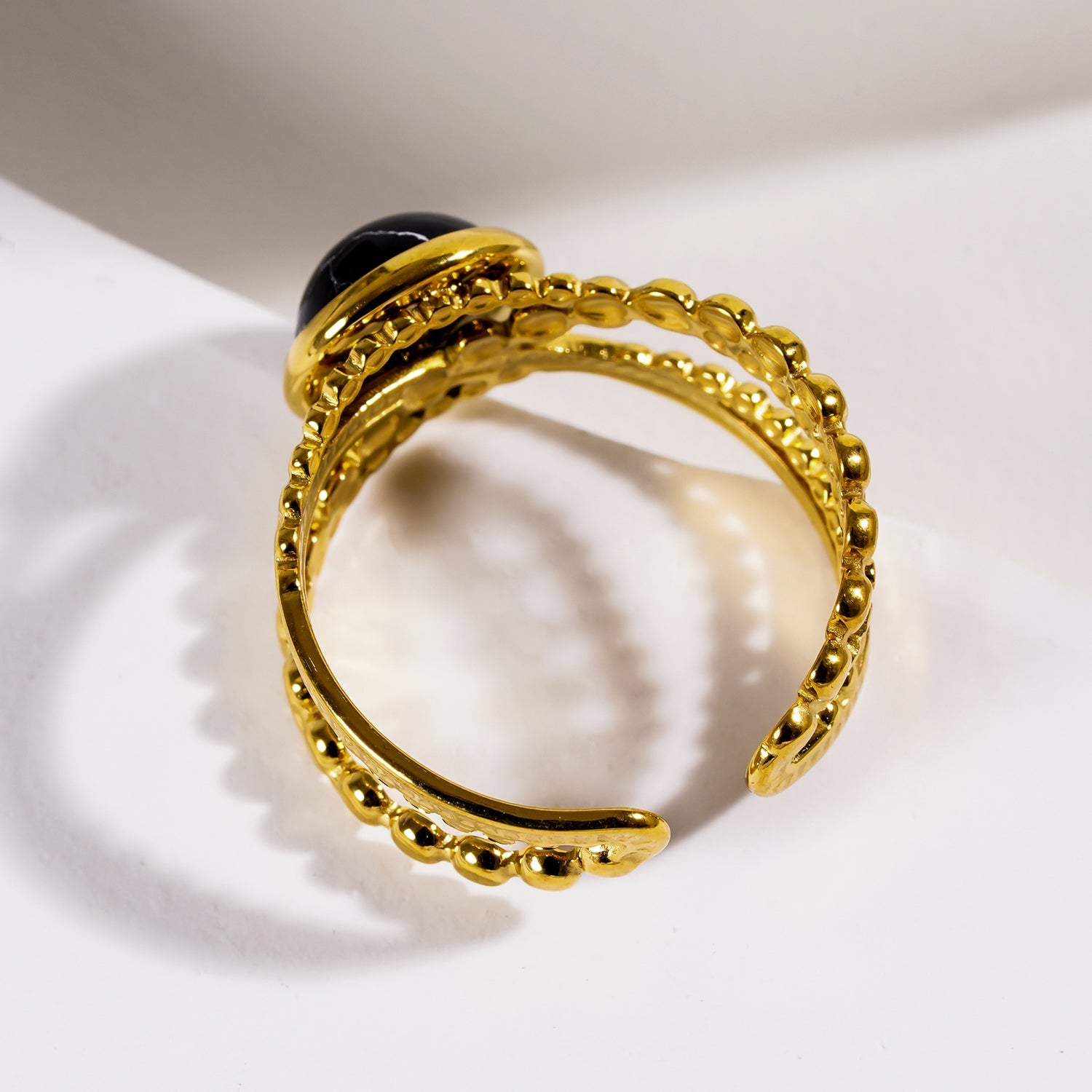 MALAYA: Cross Over Stacked Ring with a Black Turquoise Stone Centrepiece