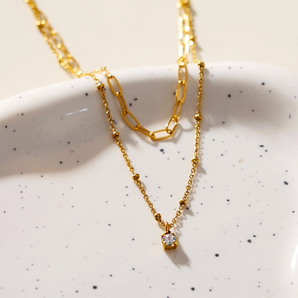 KATERI Gold: Pre-Layered Chains Necklace with a Solitaire Zirconia Charm Pendant