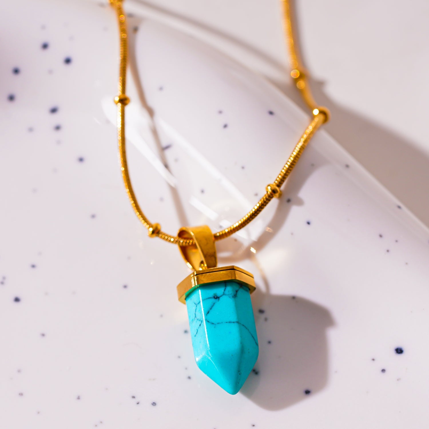 PIPPA: African Turquoise Stone Pendant Anchored on a Beaded Snake Skin Textured Chain Necklace