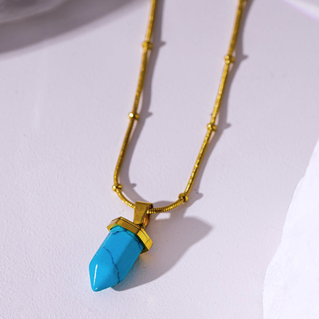 PIPPA: African Turquoise Stone Pendant Anchored on a Beaded Snake Skin Textured Chain Necklace